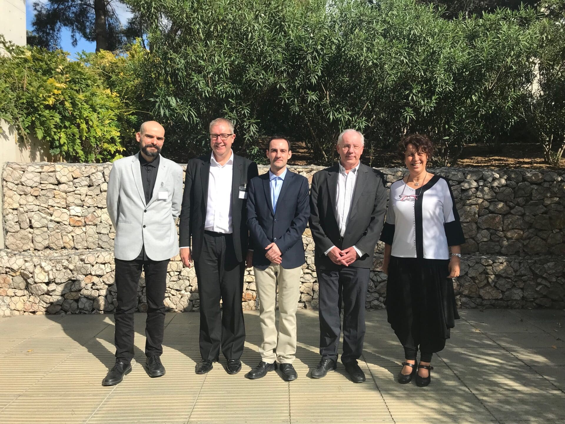 Dr. Escobar with the members of the evaluation committee and his thesis supervisor