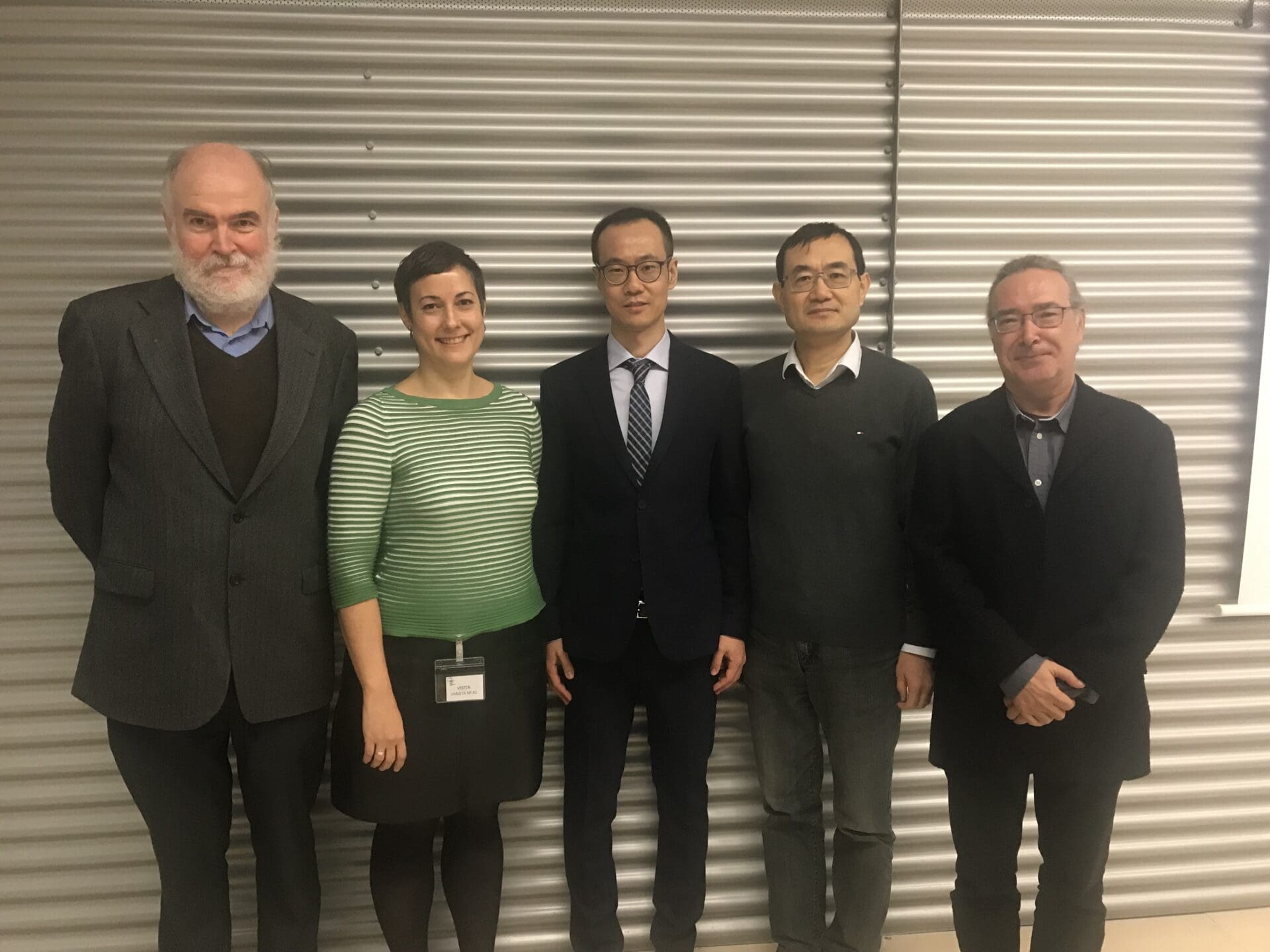 Dr. Ni with the members of the evaluation committee and his thesis supervisor