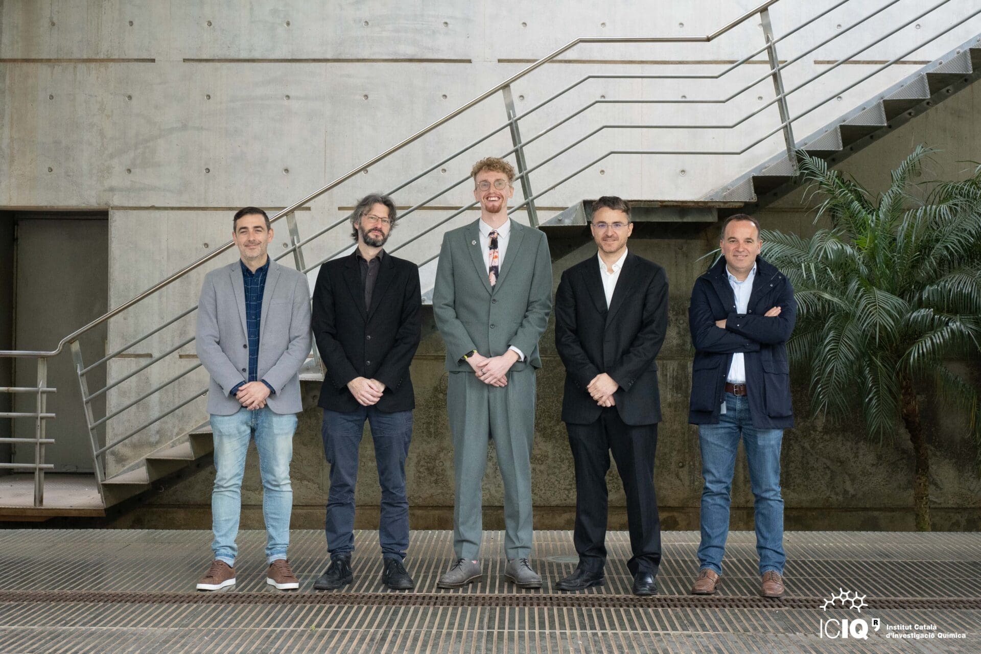 Dr. Higginson with his thesis supervisor and the members of the evaluation committee